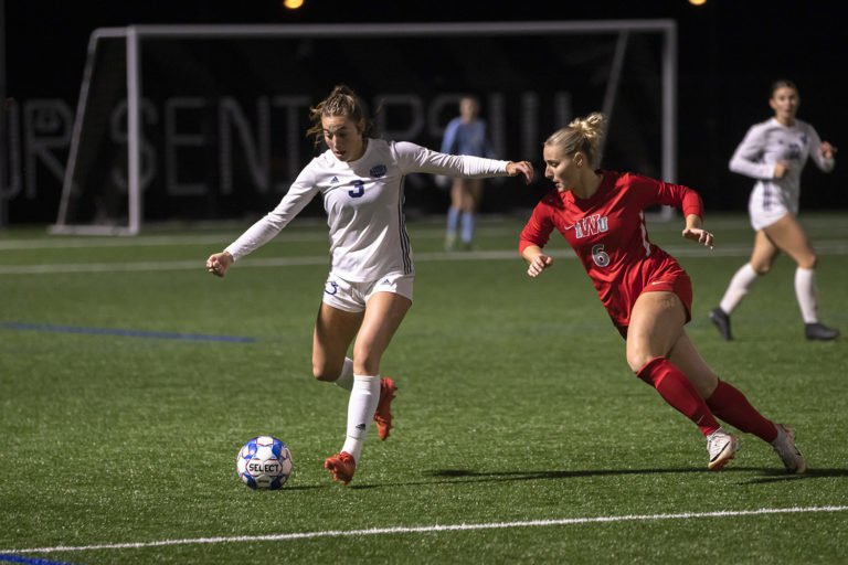 mvnu-womens-soccer-night-player-attack